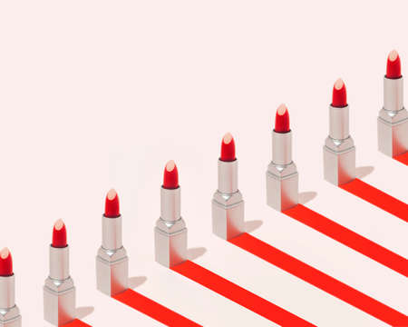 Creative red lipstick pattern with red ribbon. Minimal Fashion, makeup or cosmetic concept.