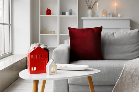 House candle holders on table in living room, closeup